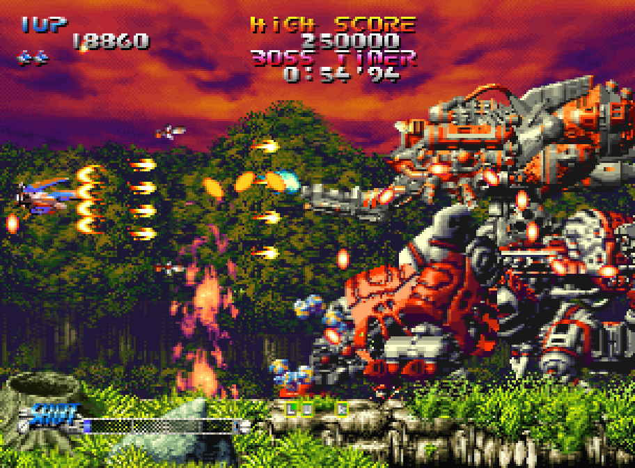 The ship faces a giant boss above the jungle in Blazing Star on the Neo Geo