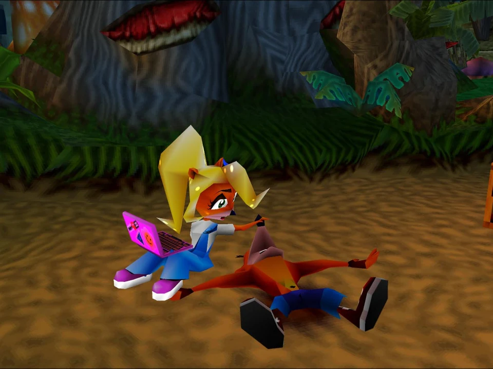 Coco Bandicoot alongside Crash, stretched out on the ground, in Crash Bandicoot 2