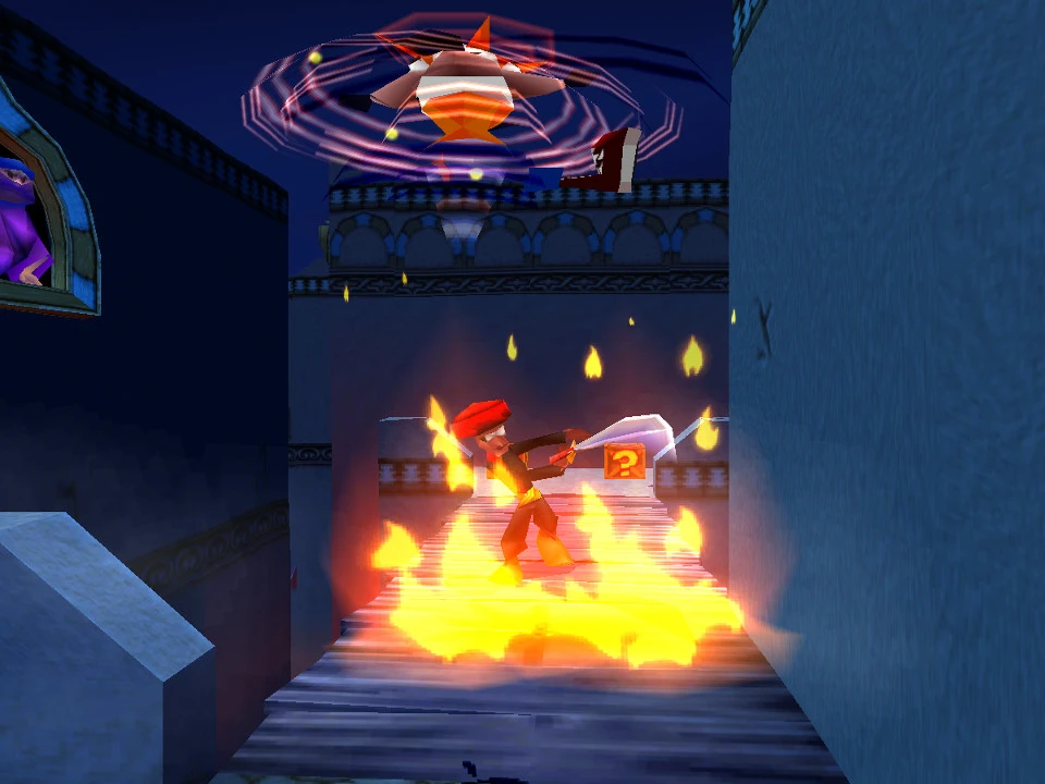 Crash at the foot of a castle at night amidst flames in Crash Bandicoot 3