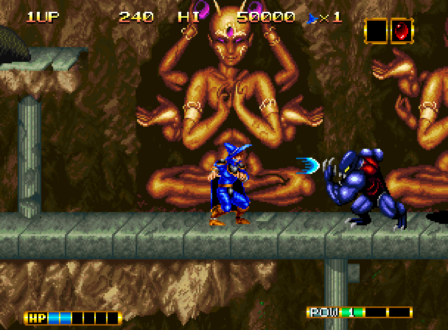 Elta fights a creature in front of a golden statue in Magician Lord on Neo Geo