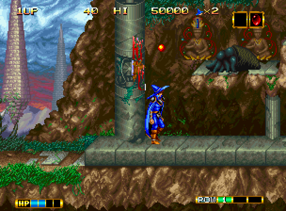 The magician Elta advances in front of stone statues in Magician Lord on Neo Geo